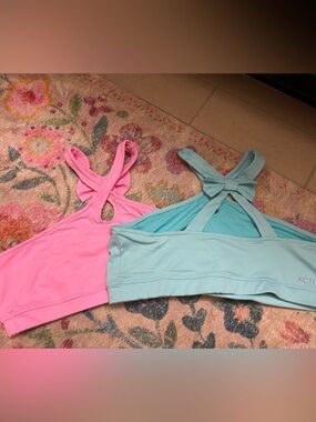 Lauren James set of pink and light blue cross neck, bow back sports bras XXL